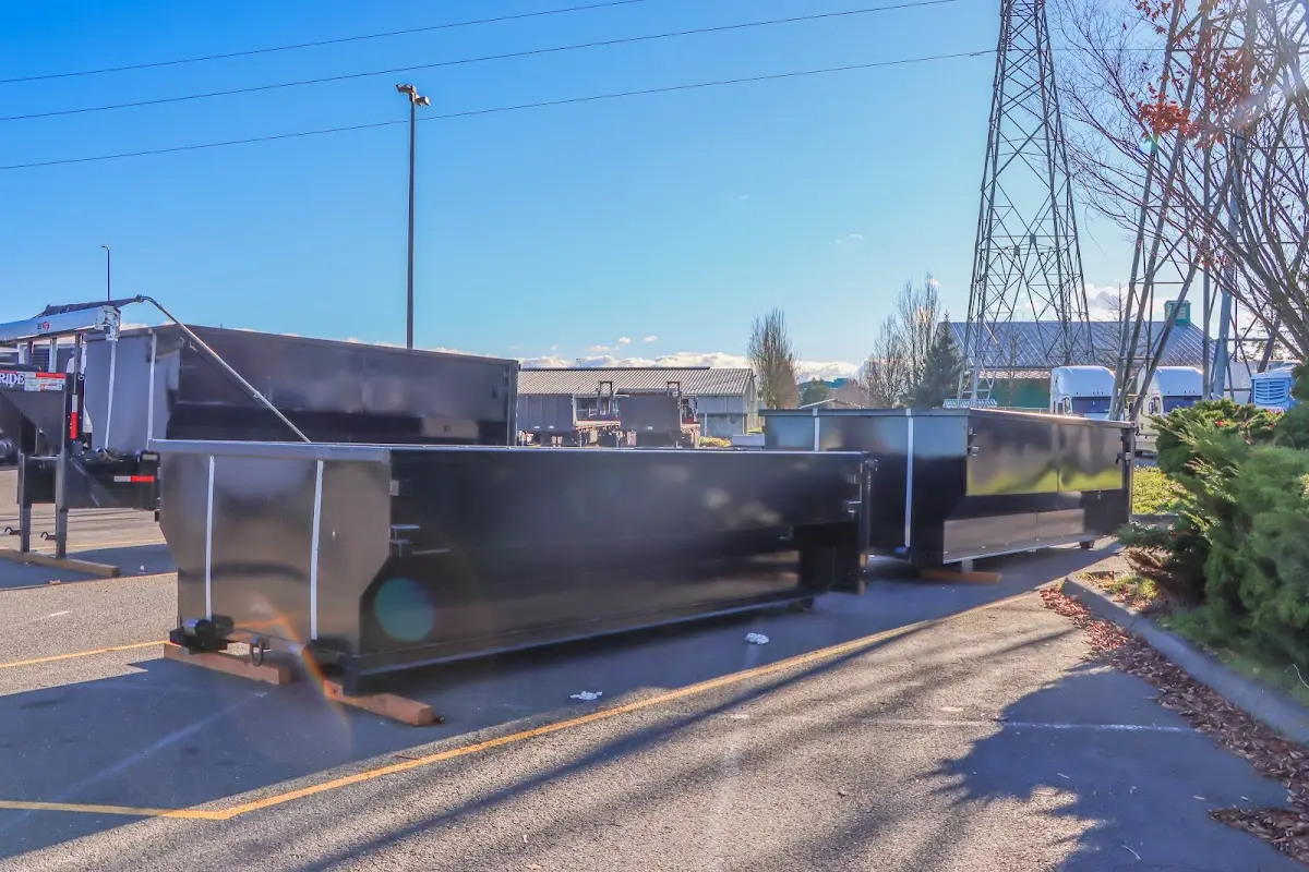 Roll-off dumpster ready for waste disposal at job site for Construction Dumpster Rental in Glastonbury